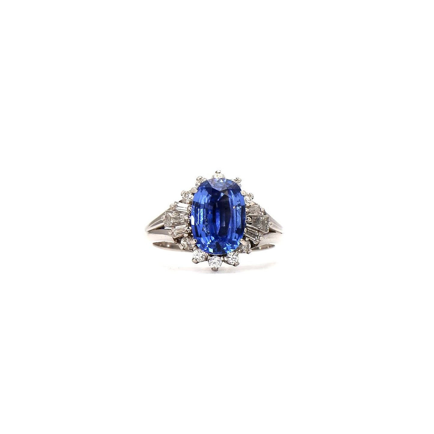 Classic Glamour: Oval Sapphire & Diamond Cluster Ring