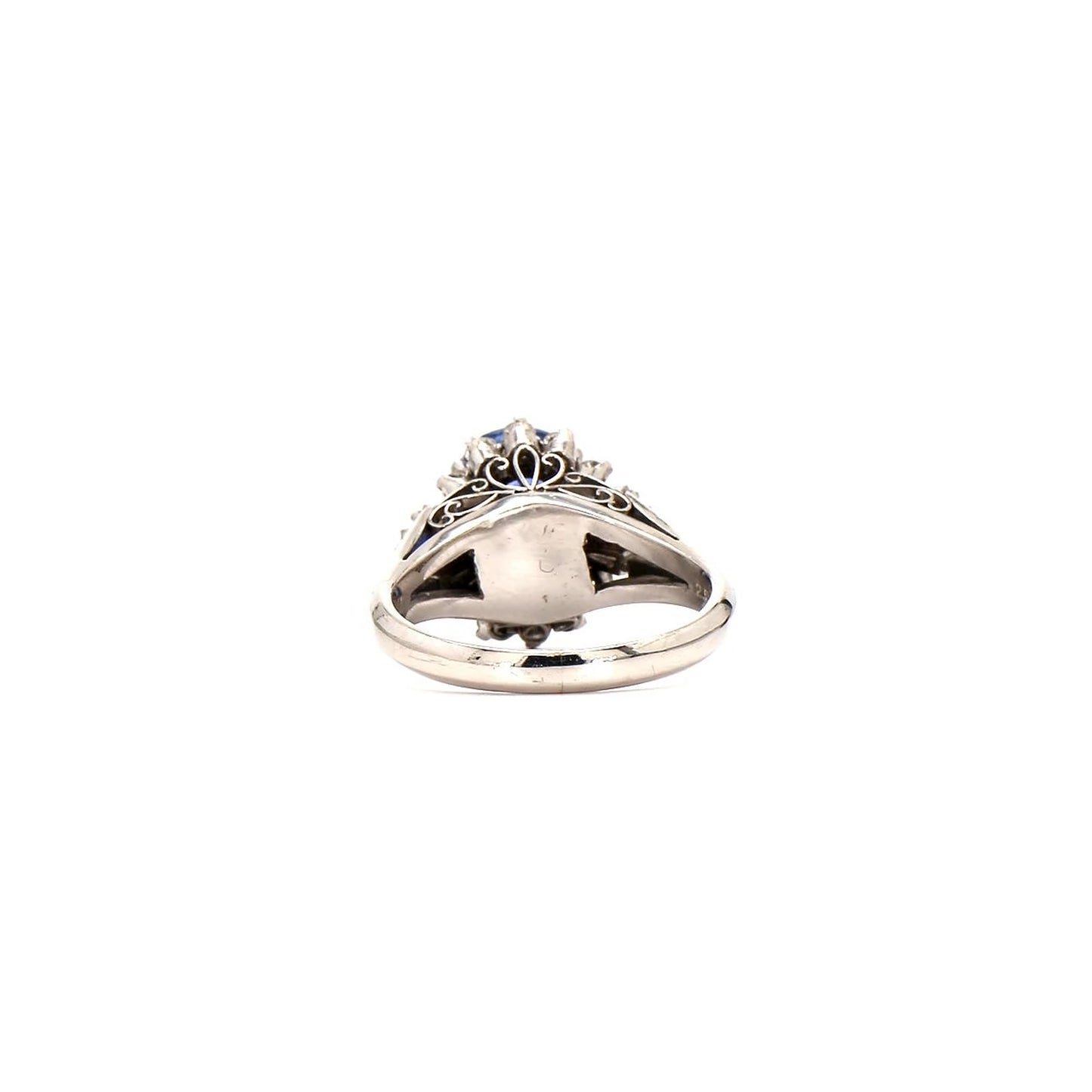 Classic Glamour: Oval Sapphire & Diamond Cluster Ring