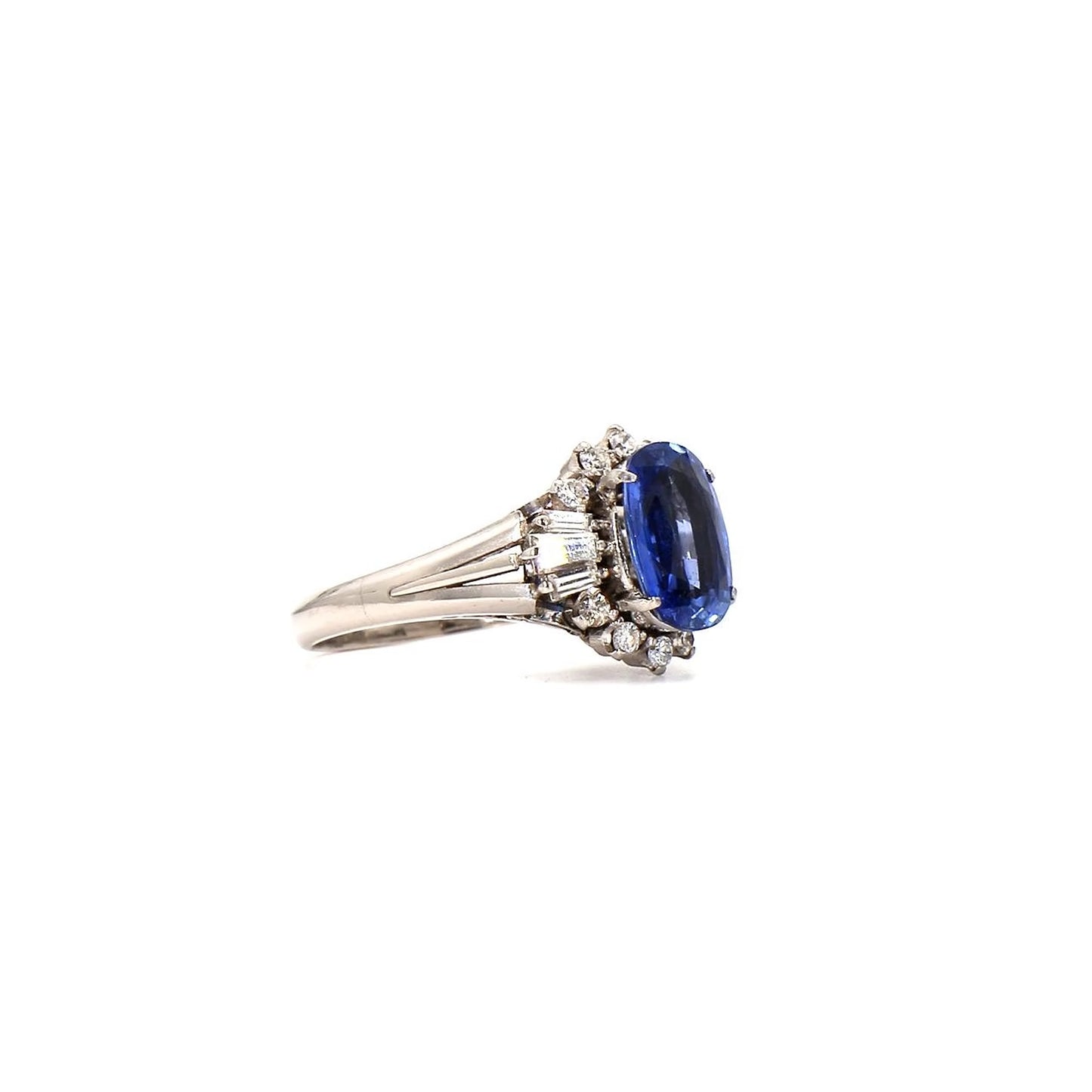 Classic Glamour: Oval Sapphire & Diamond Cluster Ring