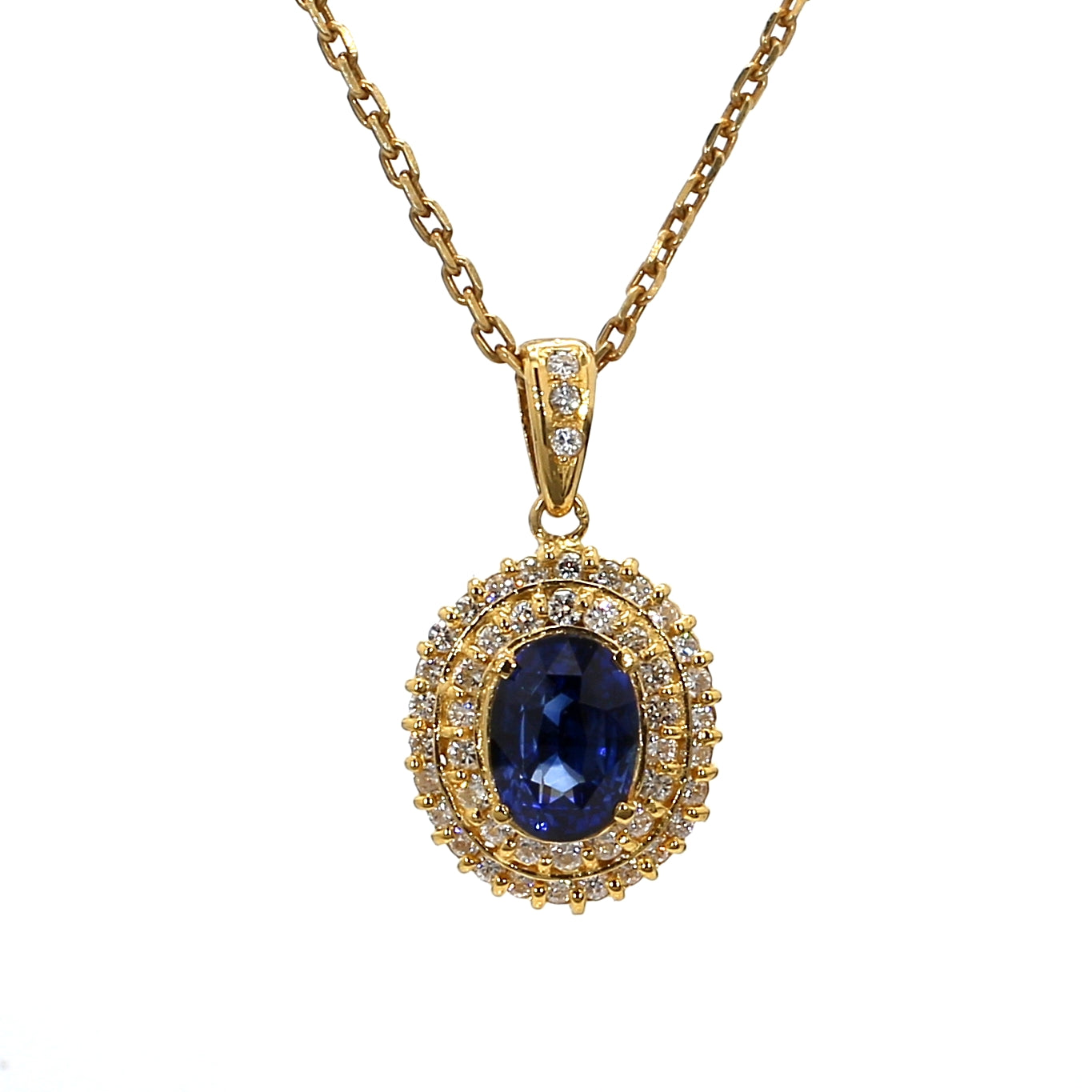 PEN39-Classic Oval Sapphire and Double Diamond Halo Pendant in Yellow Gold