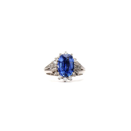 Classic Glamour: Oval Sapphire & Diamond Cluster Ring