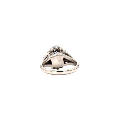 Classic Glamour: Oval Sapphire & Diamond Cluster Ring