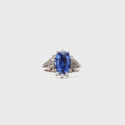 Classic Glamour: Oval Sapphire & Diamond Cluster Ring