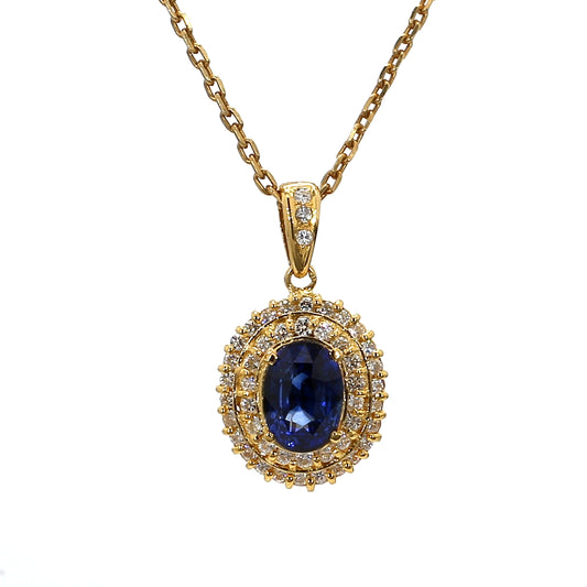 PEN39-Classic Oval Sapphire and Double Diamond Halo Pendant in Yellow Gold